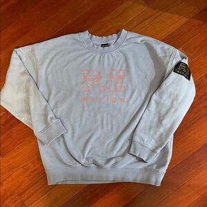 P.E Nation Crewneck Sweater in Light Blue and Pink Logo Size L